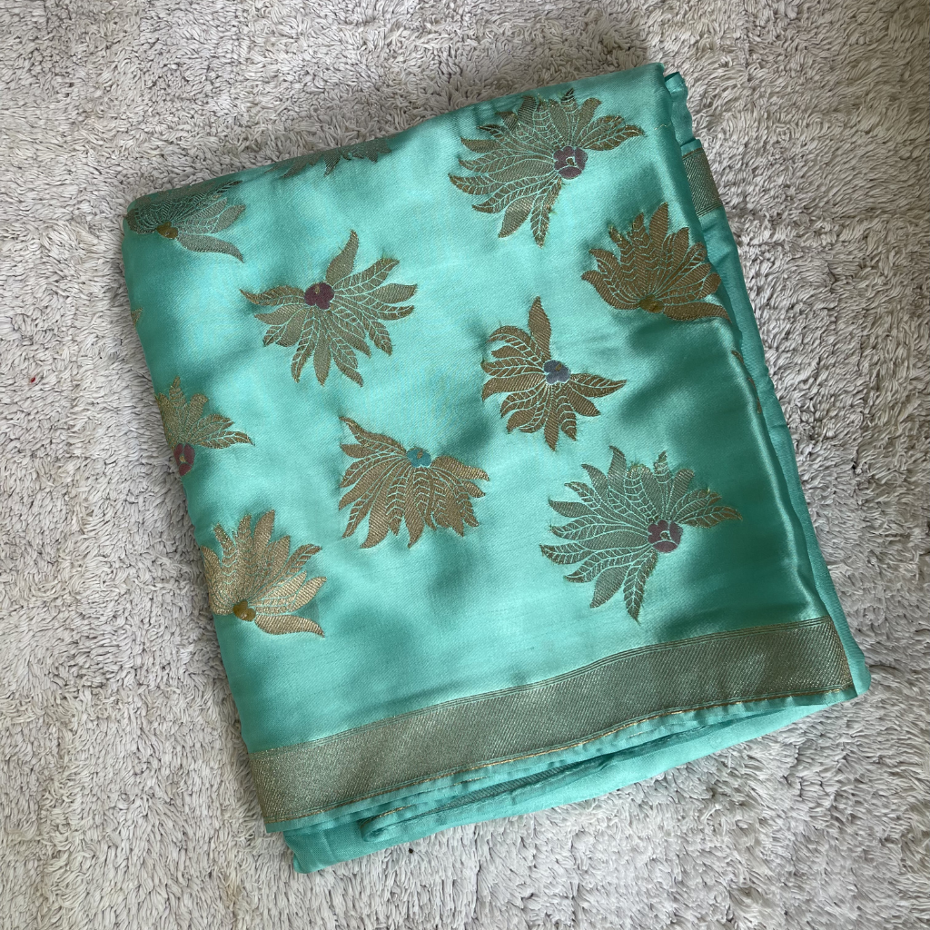 Sea Green Banarasi Satin Silk Saree With Golden And Silver Floral Weaved
