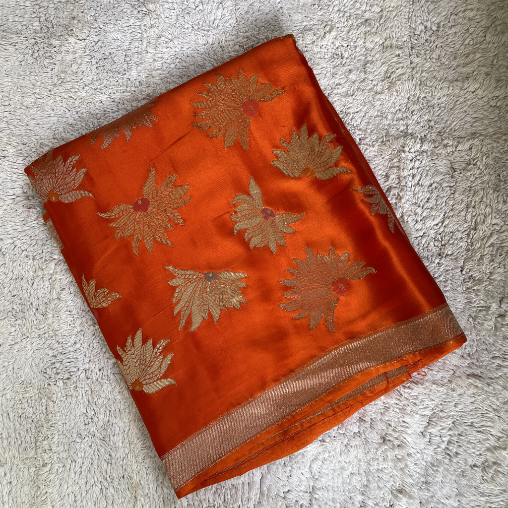 Orange Banarasi Satin Silk Saree With Golden And Silver Floral Weaved