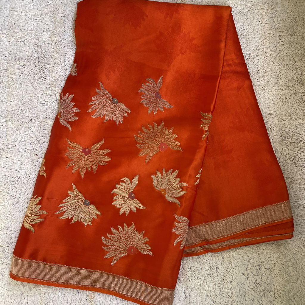 Orange Banarasi Satin Silk Saree With Golden And Silver Floral Weaved