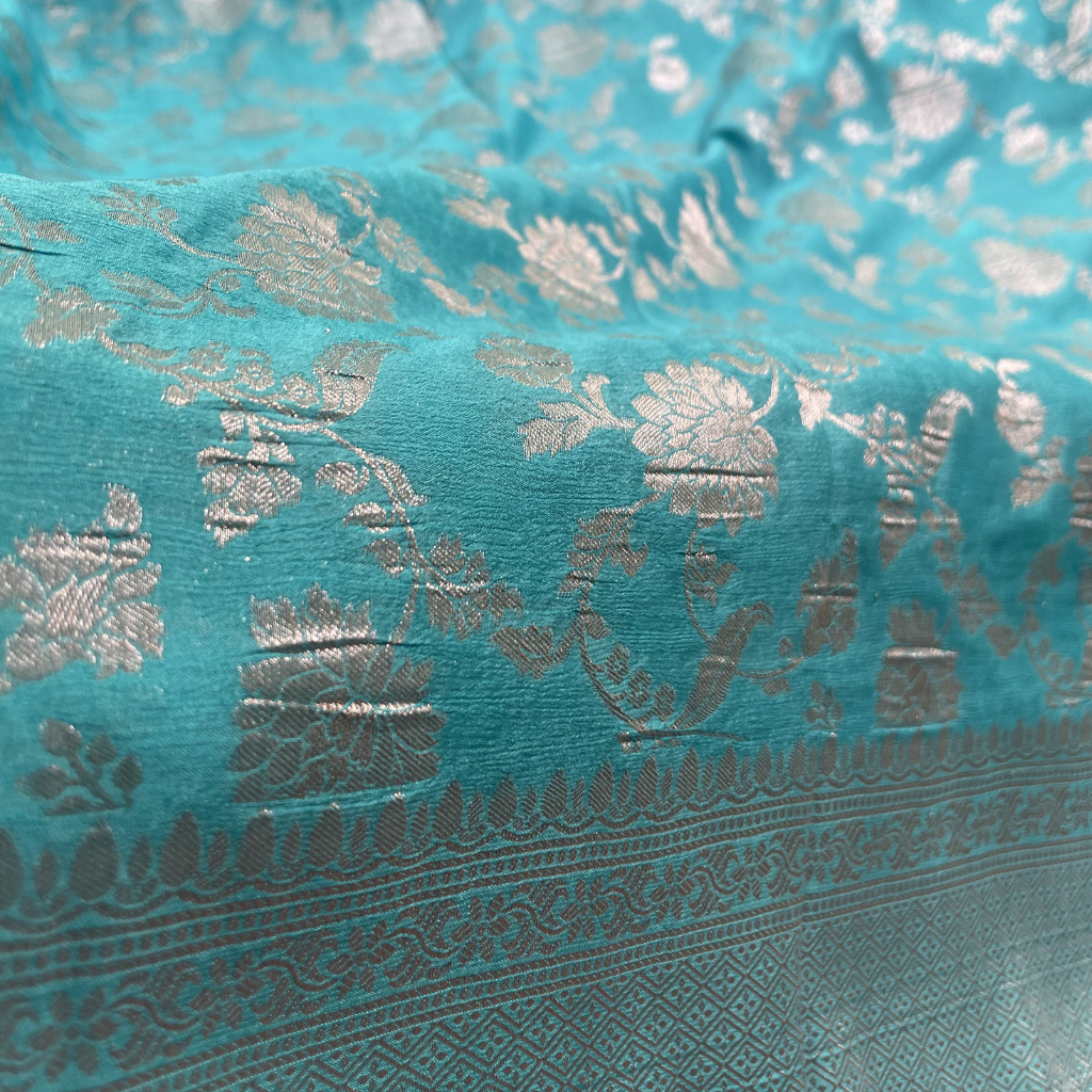 Sea Green Banarasi Georget In Floral Silver Zari Weaved