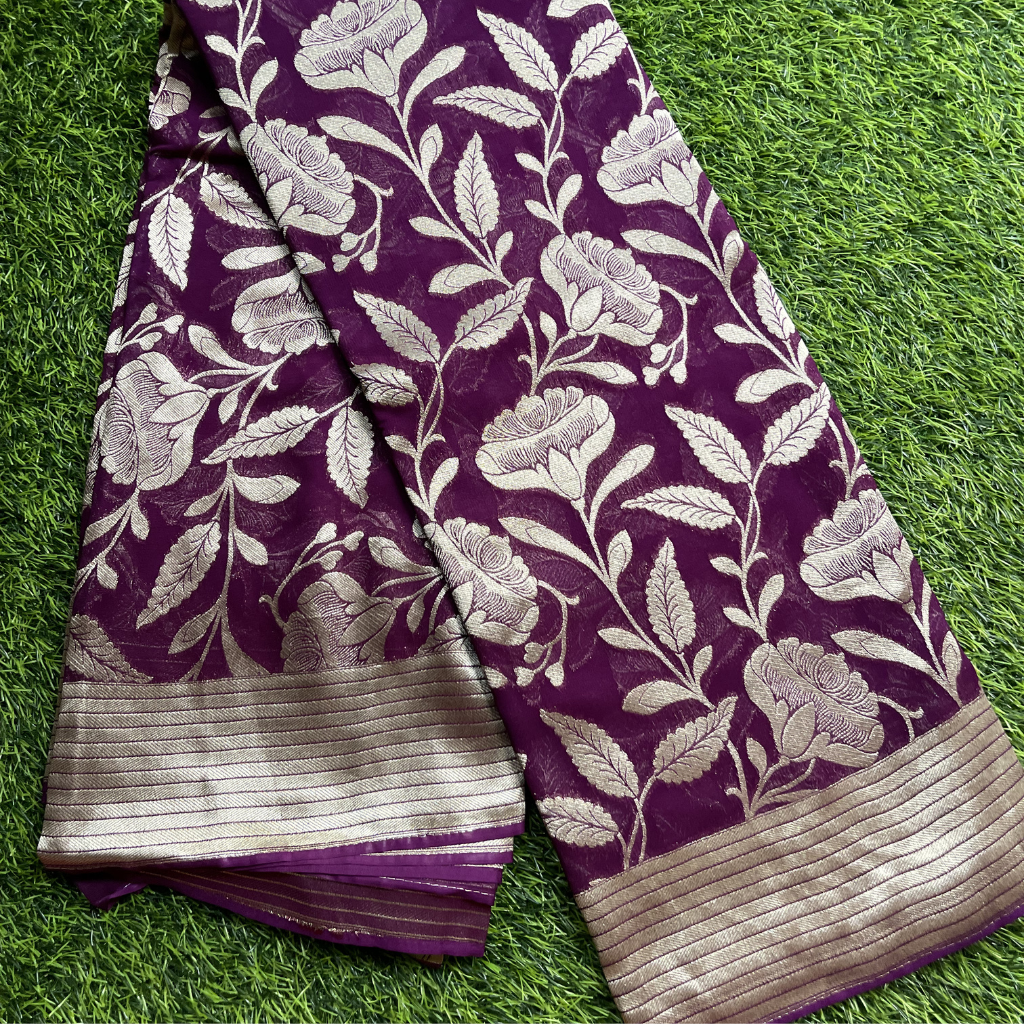 Georget Purple Colour With Floral Silver Zari Weaved Saree
